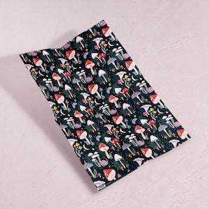 Mushrooms gift wrap sheets by Sister Paper Co. Use these mushroom gift wrap sheets as mushroom wrapping paper for your birthday gifts, anniversary presents or as craft paper.