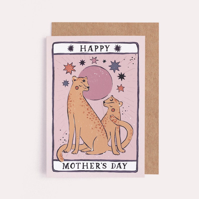 Mothers Day card with tarot card style artwork of leopard mum and little leopard in the style of a tarot card with a pink background and stars.
