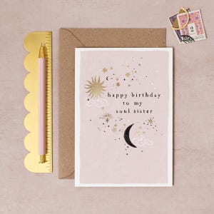 Soul Sister birthday card with goldshiny constellations and stars and a moon alongside the lettering happy birthday to my soul sister
