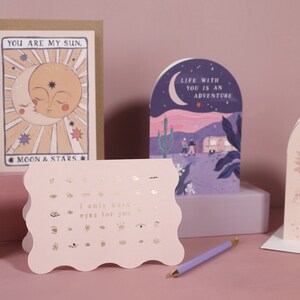 A love card, wedding card or annivesary card featuring luxe stamped gold foil details from the Cosmique range of greeting cards from Sister Paper Co.