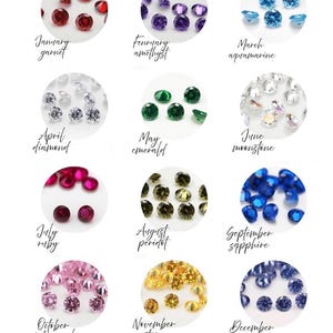 May include: A collection of gemstones representing birthstones for each month of the year. Includes January garnet, February amethyst, March aquamarine, April diamond, May emerald, June moonstone, July ruby, August peridot, September sapphire, October pink tourmaline, November citrine, and December tanzanite.