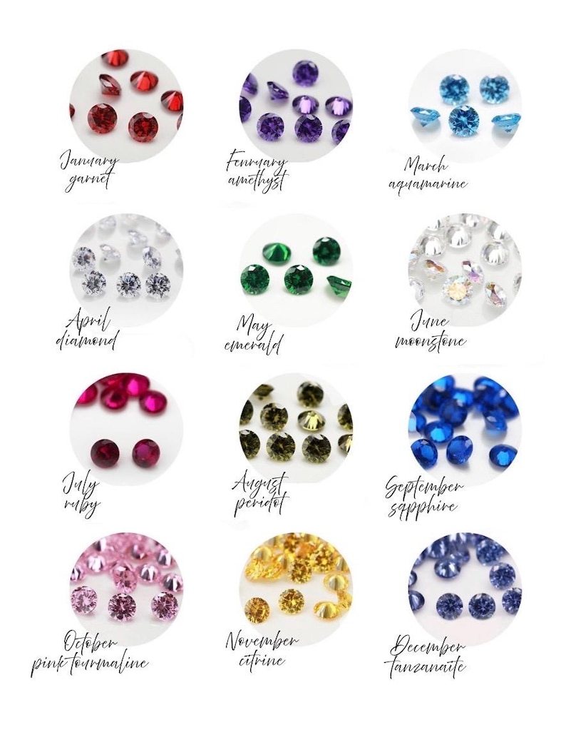 May include: A collection of gemstones representing birthstones for each month of the year. Includes January garnet, February amethyst, March aquamarine, April diamond, May emerald, June moonstone, July ruby, August peridot, September sapphire, October pink tourmaline, November citrine, and December tanzanite.
