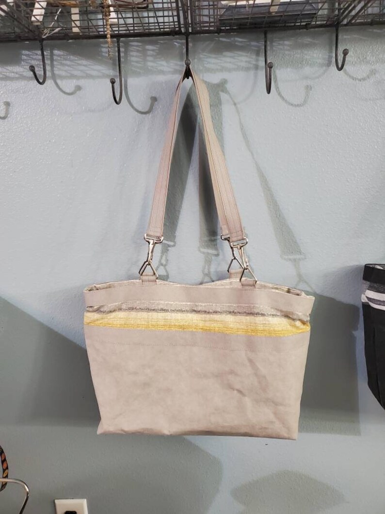 drawstring closure Project or Tote bag: versatile as a smaller tote inner pockets outer pocket with Kraft-tex taller tote