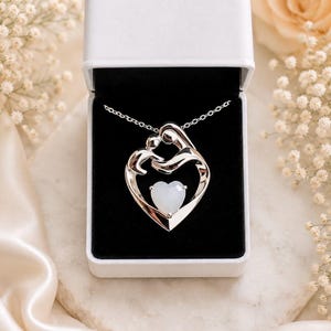 Mother holding child Breastmilk Pendant image 4