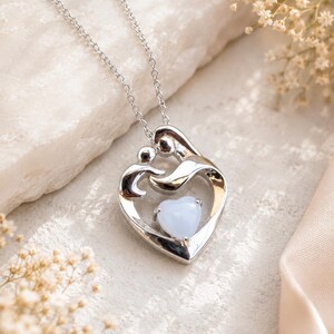 Mother holding child Breastmilk Pendant image 5