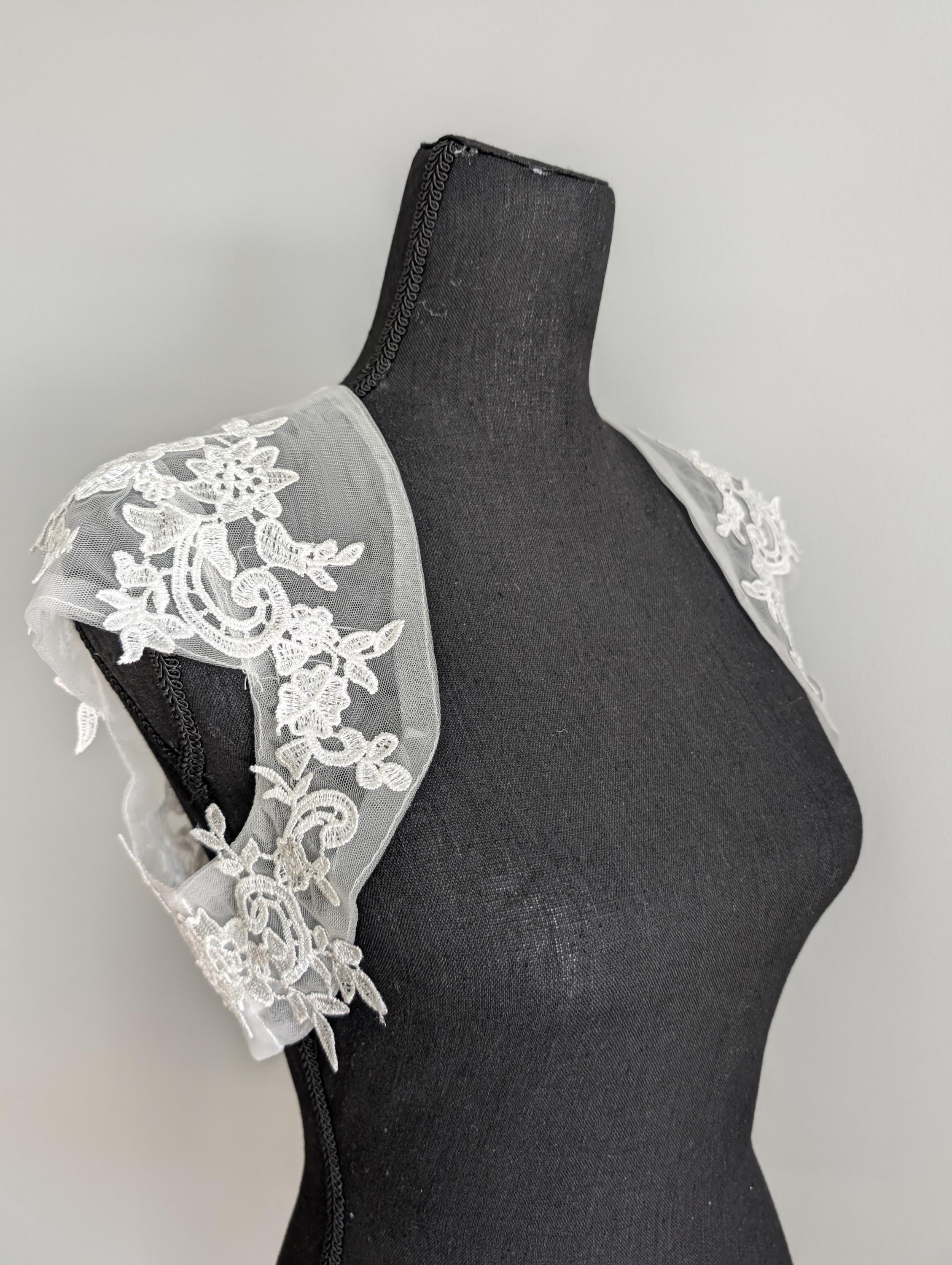 Feather bolero jacket in ivory cream