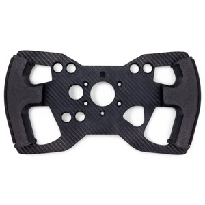 May include: A black carbon fiber steering wheel with a circular center and multiple button holes.