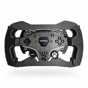 May include: A black Moza Racing steering wheel controller featuring a carbon fibre texture finish, a central logo, a directional pad, multiple labelled buttons including Radio and Home, and integrated paddle shifters on the sides.