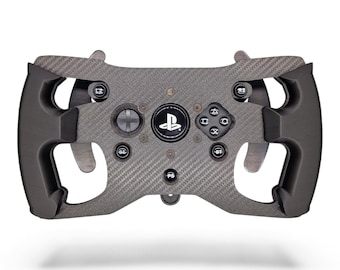 May include: A black carbon fiber racing steering wheel controller featuring a central PlayStation logo, a directional pad, four action buttons with symbols, and two shoulder buttons labeled LZ and R2, with ergonomic side grips and metal shifters.