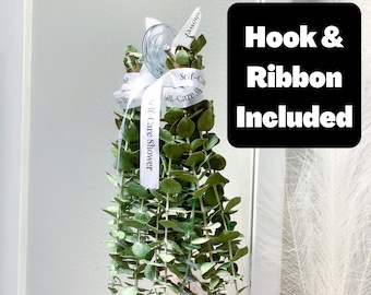 May include: A eucalyptus shower bouquet with a white ribbon that says "Self-Care Shower". Hook and ribbon included.
