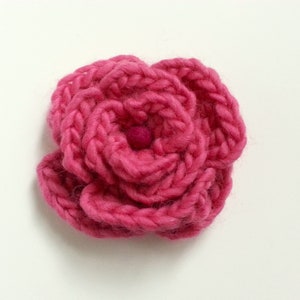Crocheted flower pin, chunky yarn in pink, darker pink felted ball center