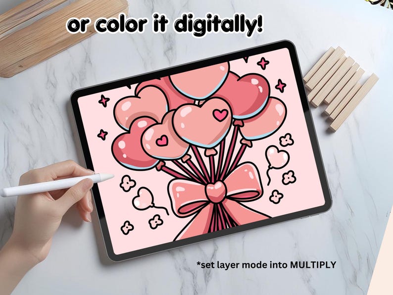 May include: A digital drawing of a bouquet of pink heart-shaped balloons tied together with a pink bow. The drawing is on a tablet screen with the text "or color it digitally!" at the top and "*set layer mode into MULTIPLY" at the bottom.
