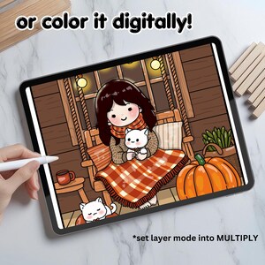 May include: A digital illustration of a girl sitting on a porch swing with a cat in her lap. The girl is wearing a red and white plaid blanket and a brown sweater. The cat is white with a pink nose. The background is a wooden porch with a pumpkin on the ground. The text "or color it digitally!" is at the top of the image. The text "*set layer mode into MULTIPLY" is at the bottom of the image.