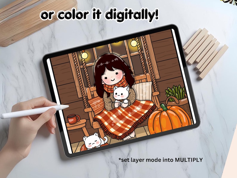 May include: A digital illustration of a girl sitting on a porch swing with a cat in her lap. The girl is wearing a red and white plaid blanket and a brown sweater. The cat is white with a pink nose. The background is a wooden porch with a pumpkin on the ground. The text "or color it digitally!" is at the top of the image. The text "*set layer mode into MULTIPLY" is at the bottom of the image.