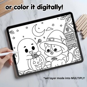 May include: A black and white printable coloring page featuring a ghost holding a jack-o-lantern, a cat wearing a witch hat, and a house with a candy cane. The text "or color it digitally!" is at the top of the page. The text "*set layer mode into MULTIPLY" is at the bottom of the page.