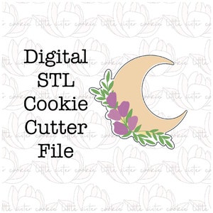 Puede incluir: Archivo de cortador de galletas STL digital. Un cortador de galletas en forma de media luna con un diseño floral en tonos verdes y morados.