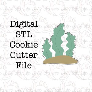 May include: Digital STL cookie cutter file for creating seaweed shapes. The cutter is shown in a light green colour with a brown base.