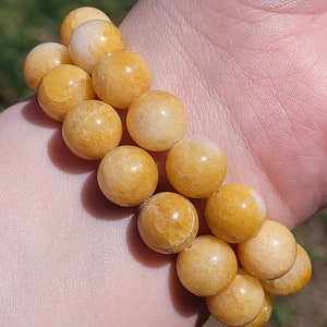 12mm Orange Calcite Handmade Bracelet with Metal Accent Closure Bead: Energizing, Uplifting, & Motivating