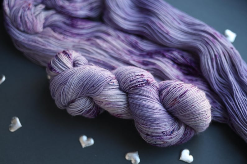 tweed yarn,
hand dyed yarn,
gradient yarn,
sock yarn,
nylon blend yarn,
gothic yarn,
purple wool yarn,
gifts for knitters,
juicy purple yarn,
yarn cozy,
yarn lover gift,
natural dyed yarn,
pastel yarn,