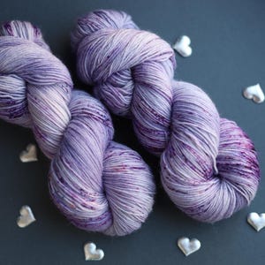 tweed yarn,
hand dyed yarn,
gradient yarn,
sock yarn,
nylon blend yarn,
gothic yarn,
purple wool yarn,
gifts for knitters,
juicy purple yarn,
yarn cozy,
yarn lover gift,
natural dyed yarn,
pastel yarn,