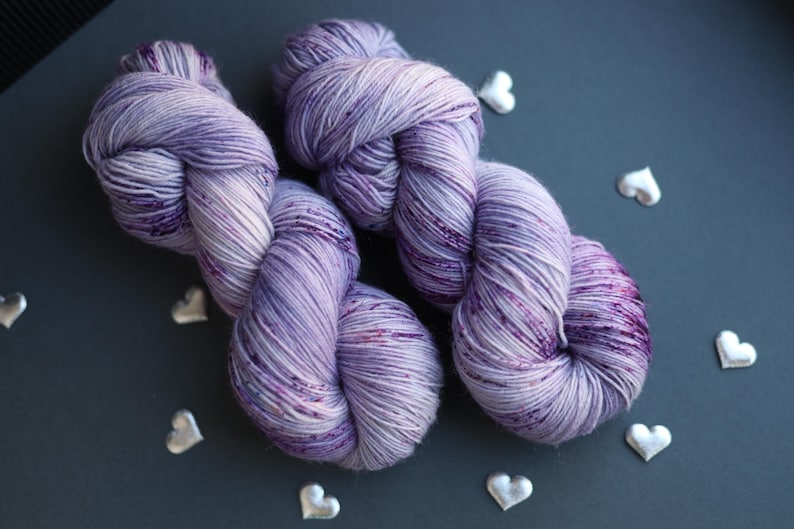 tweed yarn,
hand dyed yarn,
gradient yarn,
sock yarn,
nylon blend yarn,
gothic yarn,
purple wool yarn,
gifts for knitters,
juicy purple yarn,
yarn cozy,
yarn lover gift,
natural dyed yarn,
pastel yarn,