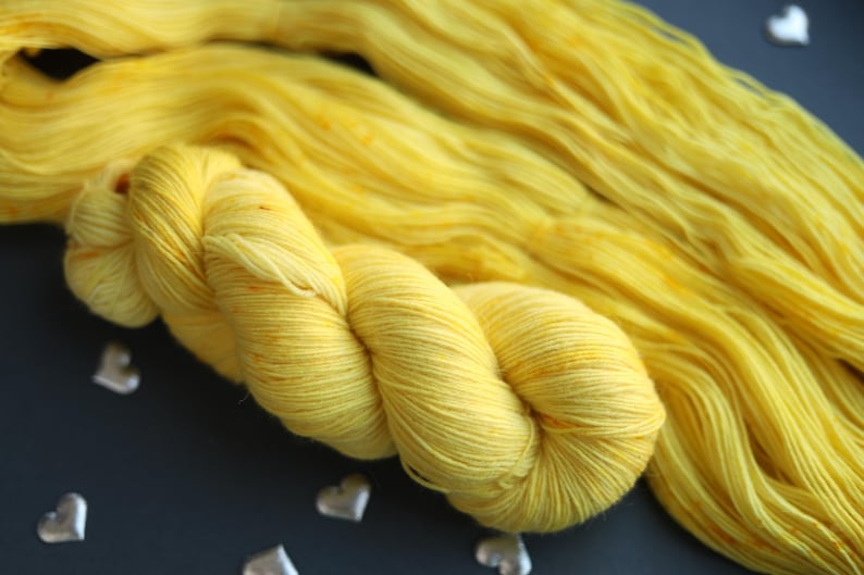 tweed yarn,
hand dyed yarn,
gradient yarn,
sock yarn,
nylon blend yarn,
gothic yarn,
purple wool yarn,
gifts for knitters,
juicy purple yarn,
yarn cozy,
yarn lover gift,
natural dyed yarn,
pastel yarn,