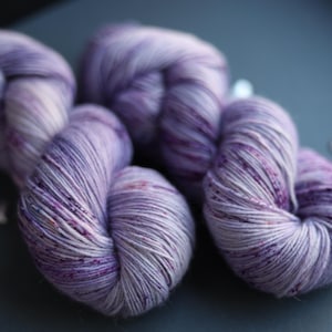tweed yarn,
hand dyed yarn,
gradient yarn,
sock yarn,
nylon blend yarn,
gothic yarn,
purple wool yarn,
gifts for knitters,
juicy purple yarn,
yarn cozy,
yarn lover gift,
natural dyed yarn,
pastel yarn,