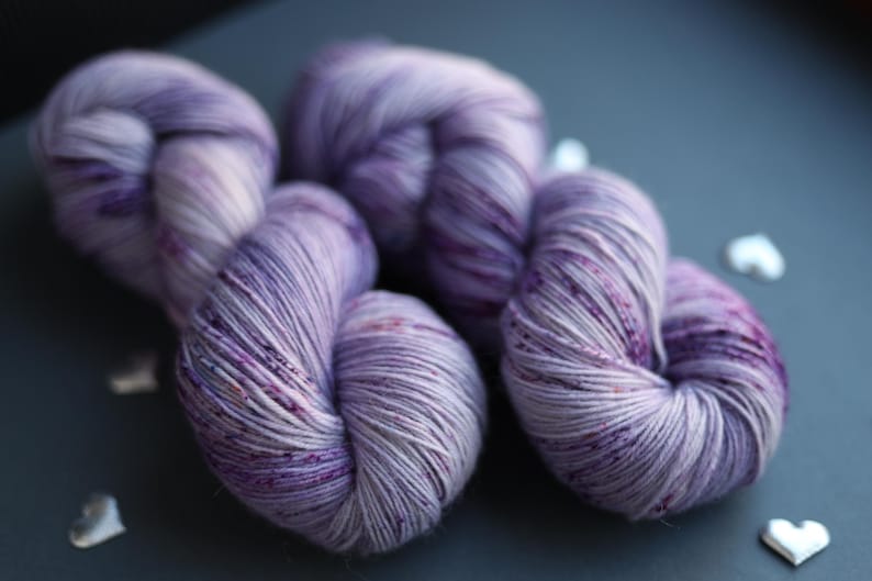 tweed yarn,
hand dyed yarn,
gradient yarn,
sock yarn,
nylon blend yarn,
gothic yarn,
purple wool yarn,
gifts for knitters,
juicy purple yarn,
yarn cozy,
yarn lover gift,
natural dyed yarn,
pastel yarn,