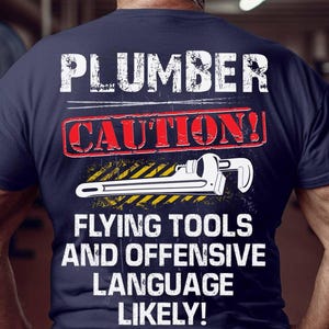 Plumber T-Shirt, Gift For Plumber, Plumber Caution Flying Tools And Offensive Language Likely.