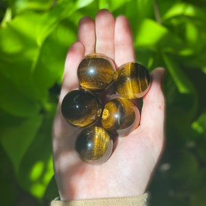 Tiger&#39;s Eye Sphere: Polished Crystal for Meditation & Grounding
