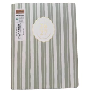 May include: A monthly planner for 2026-2027 with a sage green and white vertical striped cover. A central scalloped label features the text 26 27. A rectangular label on the left side includes the text CLEMENTINE RECYCLED 2026-2027 PLANNER.