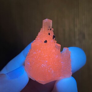 Uniquely Shaped and Highly Fluorescent Calcite with Oxide Coated Pyrite from China
