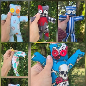 May include: A collage of handmade fabric dolls with button eyes. The dolls feature various patterns, including blue with white mushrooms, red and gray plaid, blue and white stripes, and a cactus print. Some dolls have a skull and rose design.