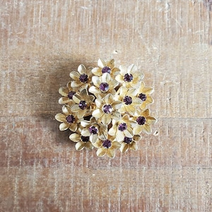 Stunning Vintage CORO Gold Tone Flower with Purple Rhinestones Brooch