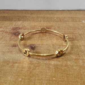 Gold Tone JUICY Bangle Bracelet
