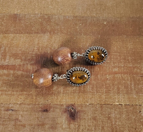 Robert rose earrings deals