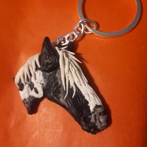 Custom polymer fimo clay pet cat dog horse portraits.  Keyrings,brooches,fridge magnets.  Handmade,bespoke gift present for an animal lover.