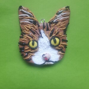 Custom polymer pet cat dog portraits.  Keyrings, brooches, fridge magnets.  Handmade, bespoke gift present for an animal pet lover.