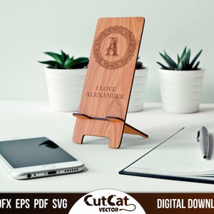 Wood phone stand holder laser engraved cut svg glowforge files with an individual ornament and alphabet letters. Digital file cutting.