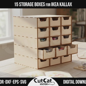 May include: A light-colored wooden storage unit featuring 15 individual drawers arranged in a grid, designed for an IKEA Kallax shelf. The unit has a modular construction with visible joinery. Text at the top reads 15 STORAGE BOXES FOR IKEA KALLAX.
