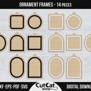 Peut inclure: Ensemble de 14 cadres en bois pour ornements, de formes variées : carrés, cercles, ovales et arches. Chaque cadre est bordé d'une ligne sombre et percé d'un trou pour suspendre. Le texte "ORNAMENT FRAMES - 14 PIECES" est en haut.
