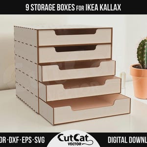 May include: A set of nine storage boxes designed for IKEA Kallax units. The boxes are made of light-colored wood with a layered design and integrated handles. The image also includes a small cactus in a terracotta pot.