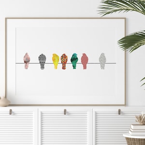 May include: A framed print of a row of eight colorful birds perched on a wire. The birds are made of patterned paper and are facing to the right. The background is white.