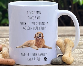 May include: White ceramic mug with a golden retriever dog image and the text "A wise man once said "Fuck it, I'm getting a golden retriever" and he lived happily ever after".
