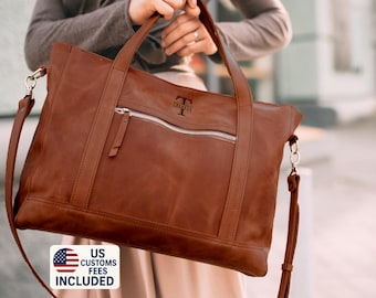 Laptop bag with a large internal compartment that can easily fit a laptop up to 15 ', as well as a folder with documents