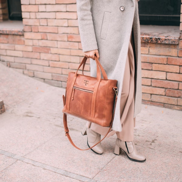 Ledertasche für die Arbeit. In verschiedenen Farben erhältlich. Reißverschluss oben für bessere Sicherheit. Zusätzliches Fach für Dokumente.