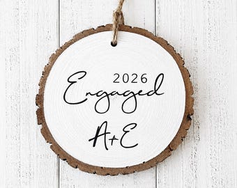 Personalized Engagement Ornament 2026 – First Christmas Engaged Wood Slice Ornament | “We’re Engaged” Keepsake | Custom Holiday Gift
