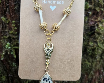 Ethically sourced bone and stone bat necklace