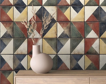 May include: A wooden dresser with a geometric patterned tile backsplash in shades of red, yellow, blue, and green. A vase with dried flowers sits on top of the dresser.