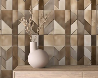 May include: A light brown wooden dresser with a vase of dried flowers on top. The wall behind the dresser is covered in brown and beige geometric tiles.